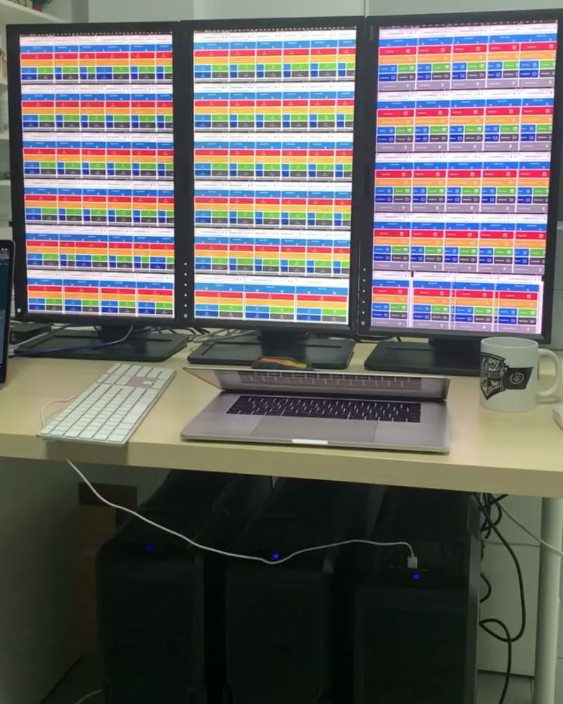 Code generation test setup with three monitors and local computers
