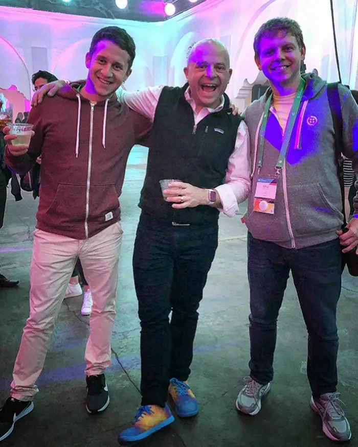 Kirill and a colleague with Twilio co-founder Jeff Lawson at SIGNAL